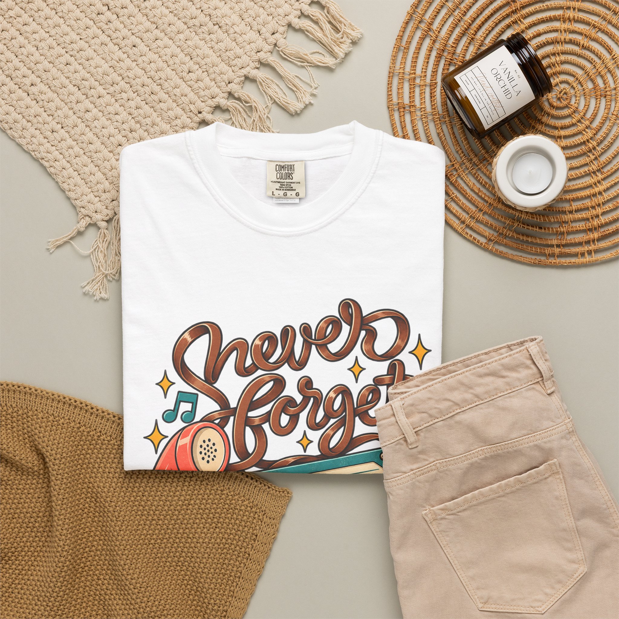 Folded Never Forget cassette garment dyed tee in a flat lay