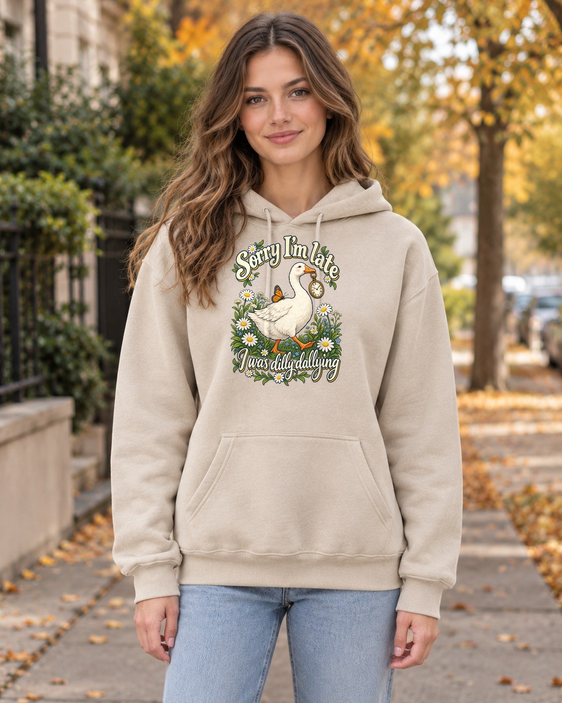 Dilly Dallying Goose Hoodie in sand worn by a model