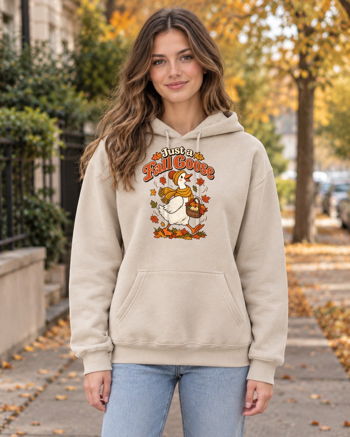 Just a Fall Goose Hoodie in sand worn by a model