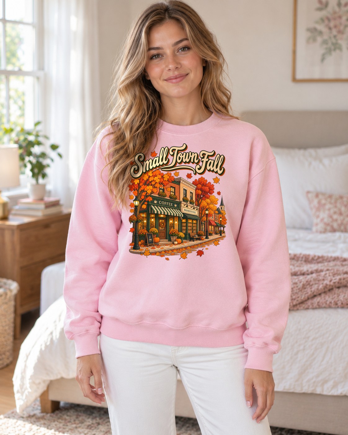 Small Town Fall Crewneck Sweatshirt in light pink worn by a model