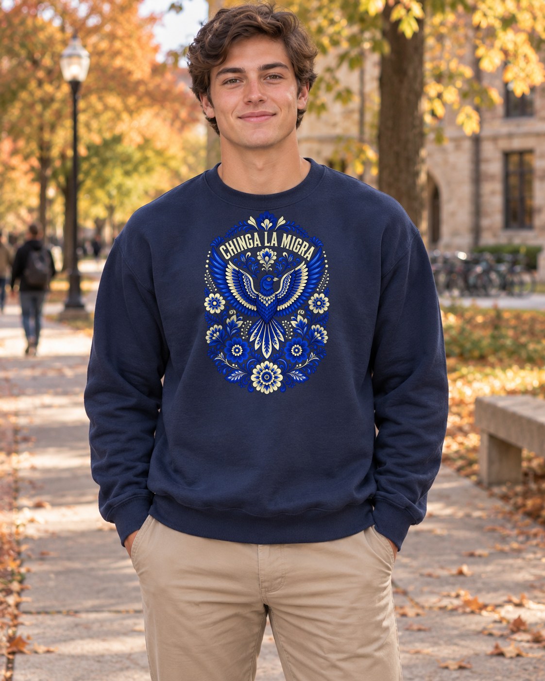 Chinga La Migra Folk Art Crewneck Sweatshirt in navy worn by a model