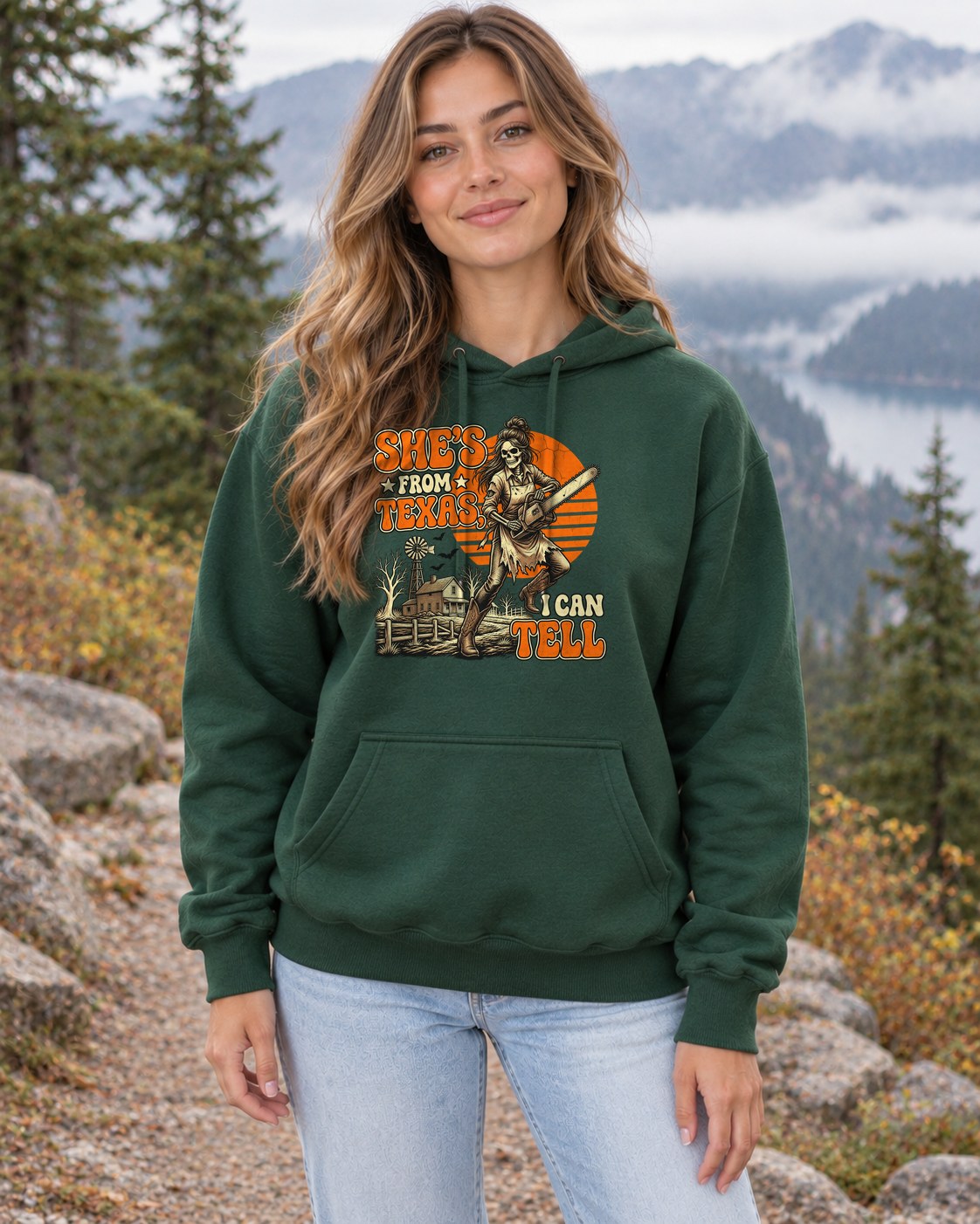 She's From Texas Skeleton Hoodie in forest green worn by a model
