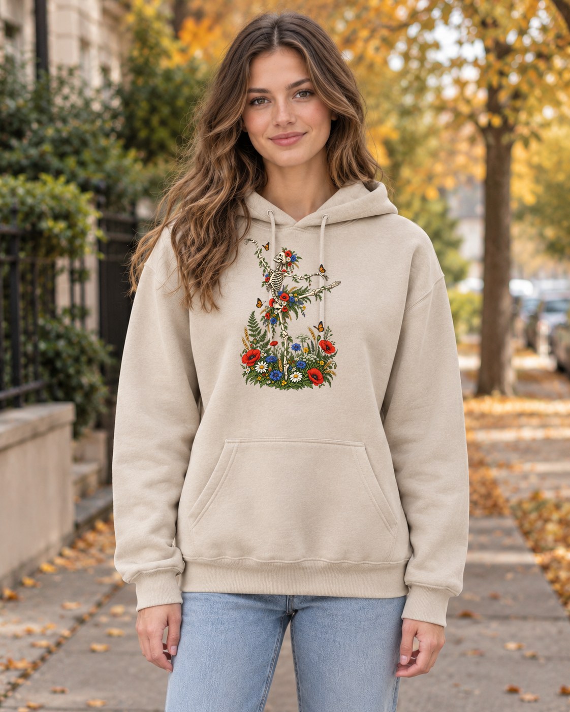 Skeleton Arabesque Wildflower Hoodie in sand worn by a model