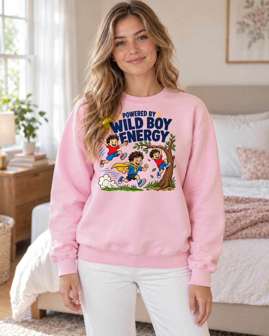 Powered by Wild Boy Energy Crewneck Sweatshirt in light pink worn by a model